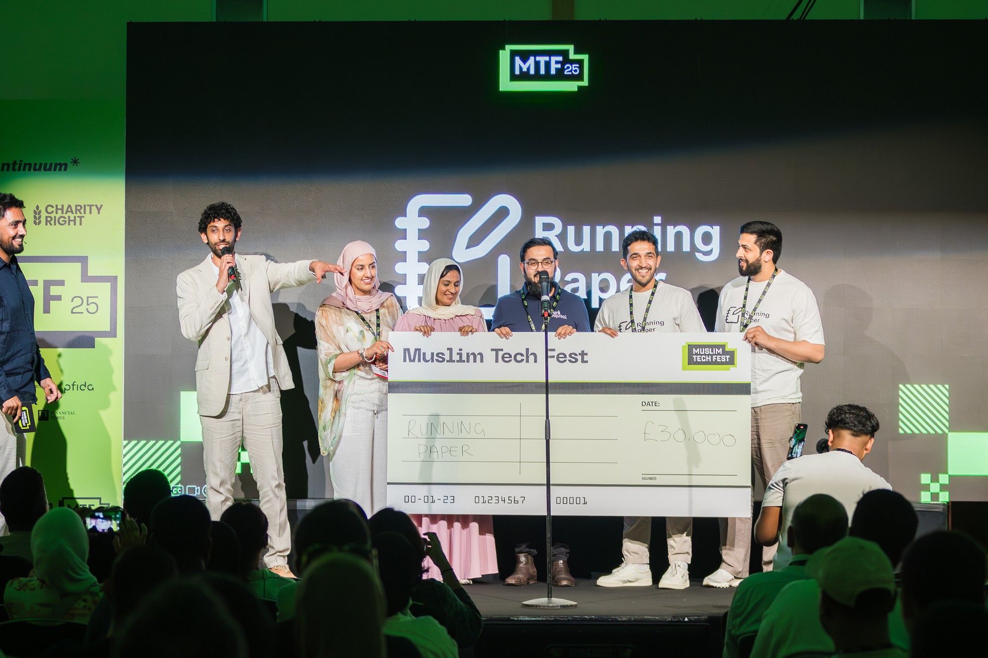 Muslim Tech Fest cheque presentation on stage