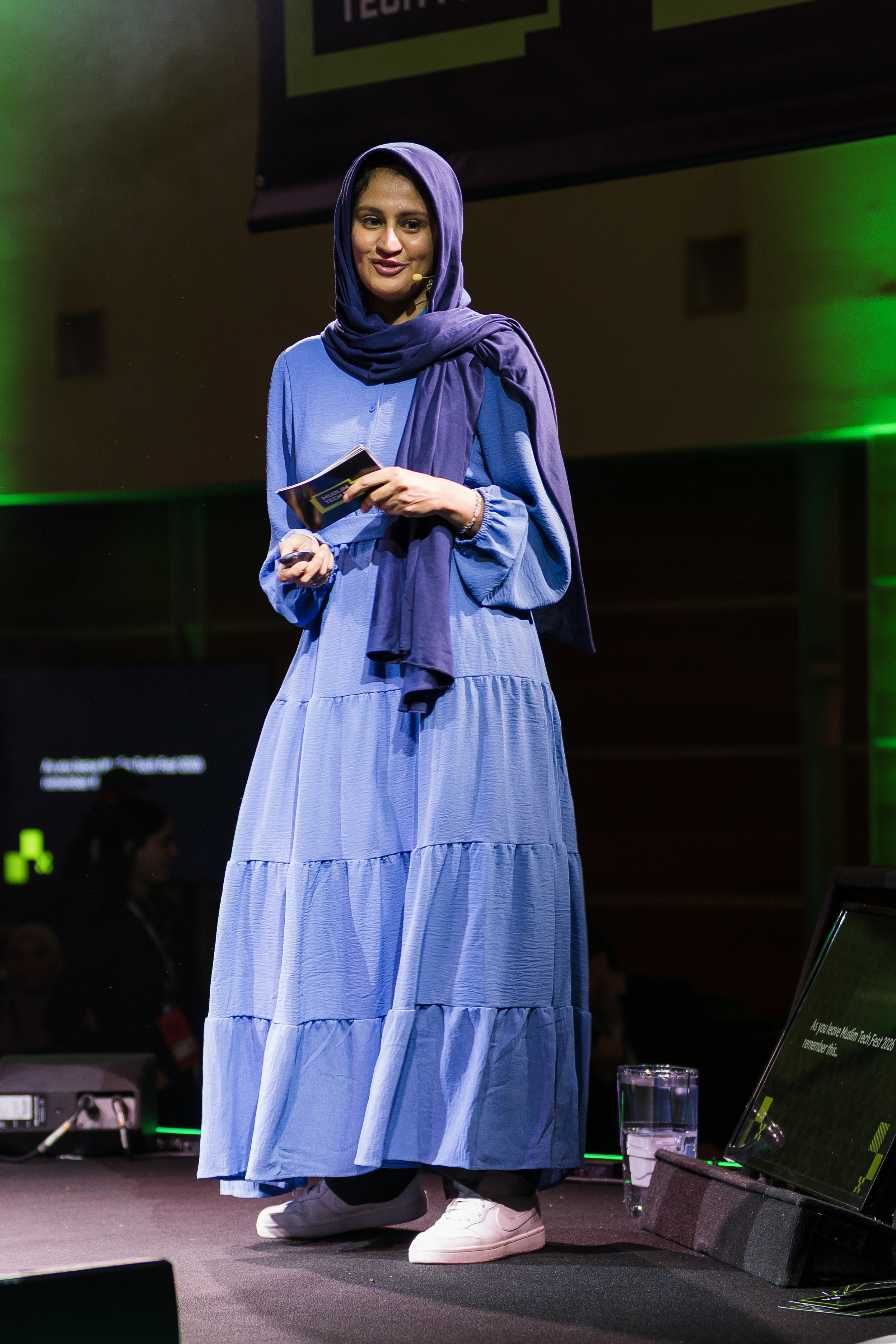 Arfah Farooq speaking on stage