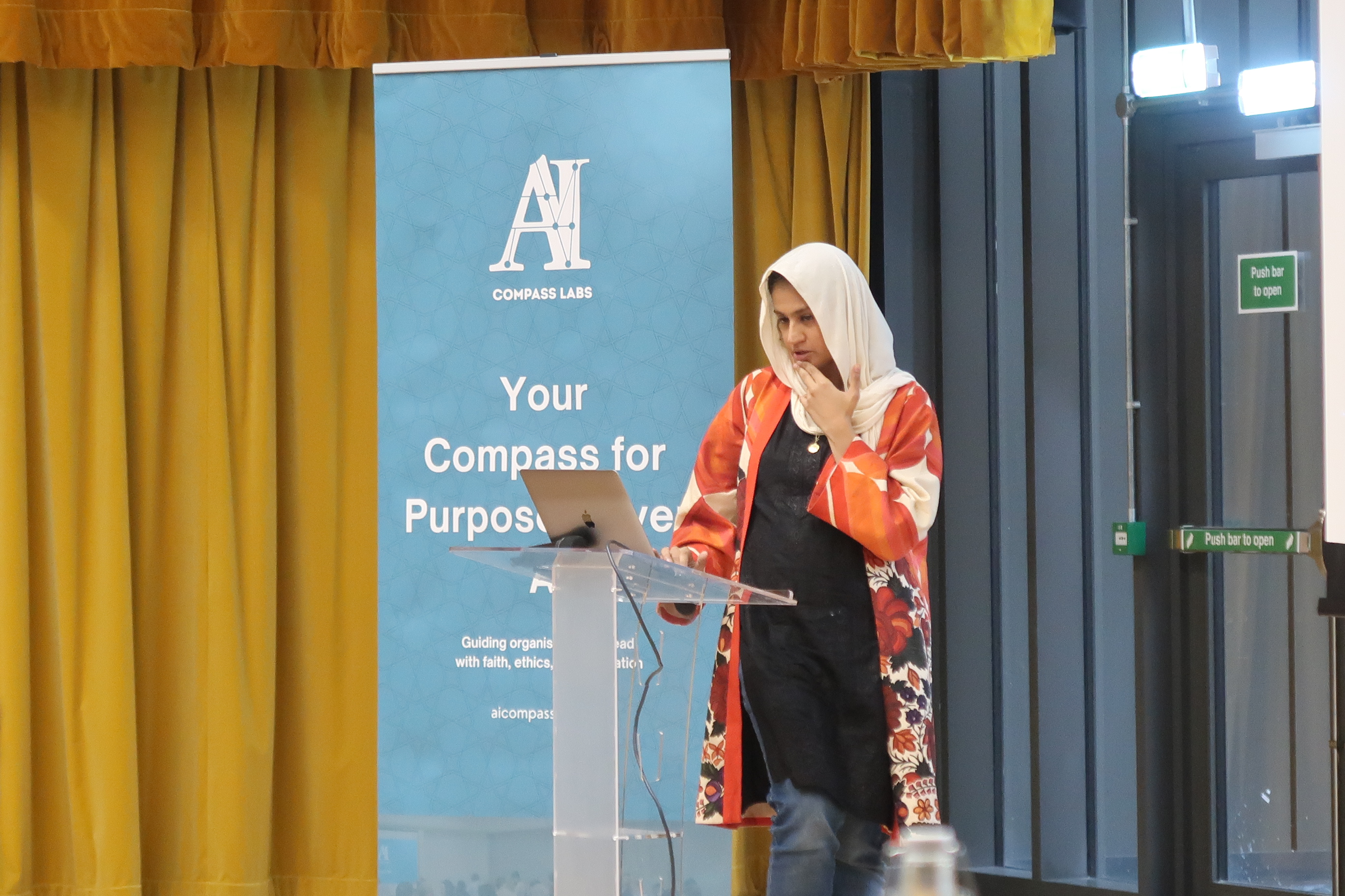 Arfah Farooq speaking at an AI Compass Labs session